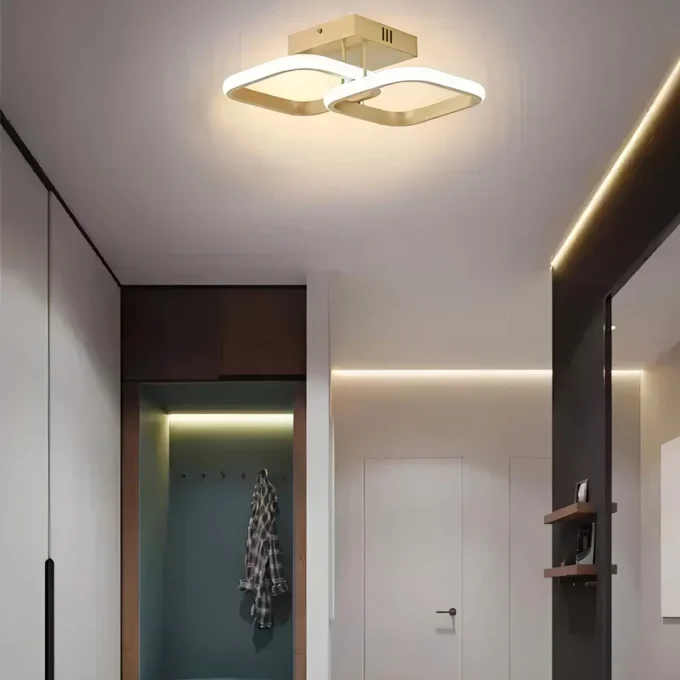 Luminária LED de Sobrepor 20W Dourada: iluminação moderna com 3 temperaturas de cor 2 Luminária LED de sobrepor 20W com estrutura dourada e iluminação 3 em 1.