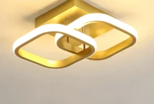 Detalhes da estrutura dourada e do sistema LED integrado da luminária de sobrepor Nitrolux Selene.